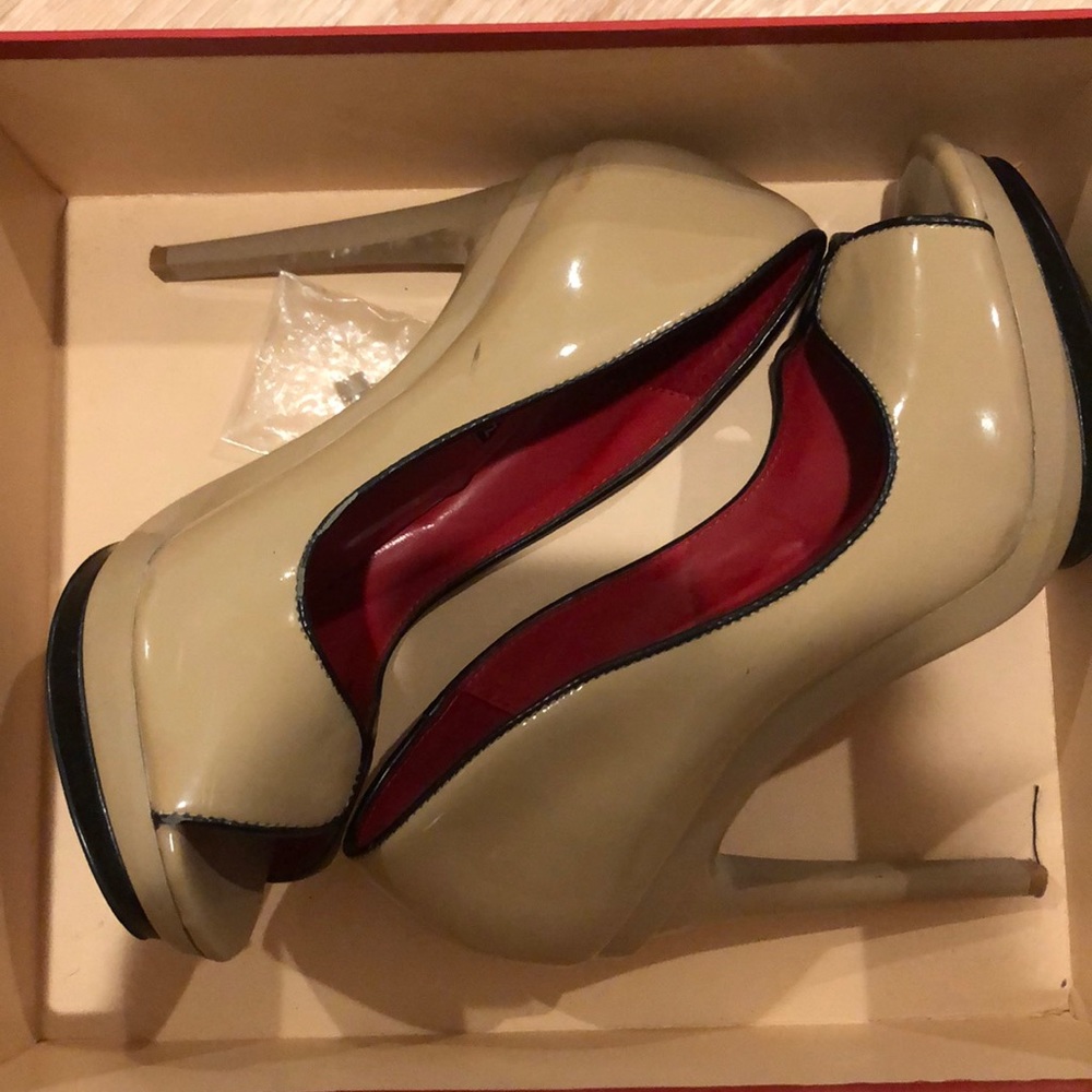 Charles Jourdan patent nude leather pumps